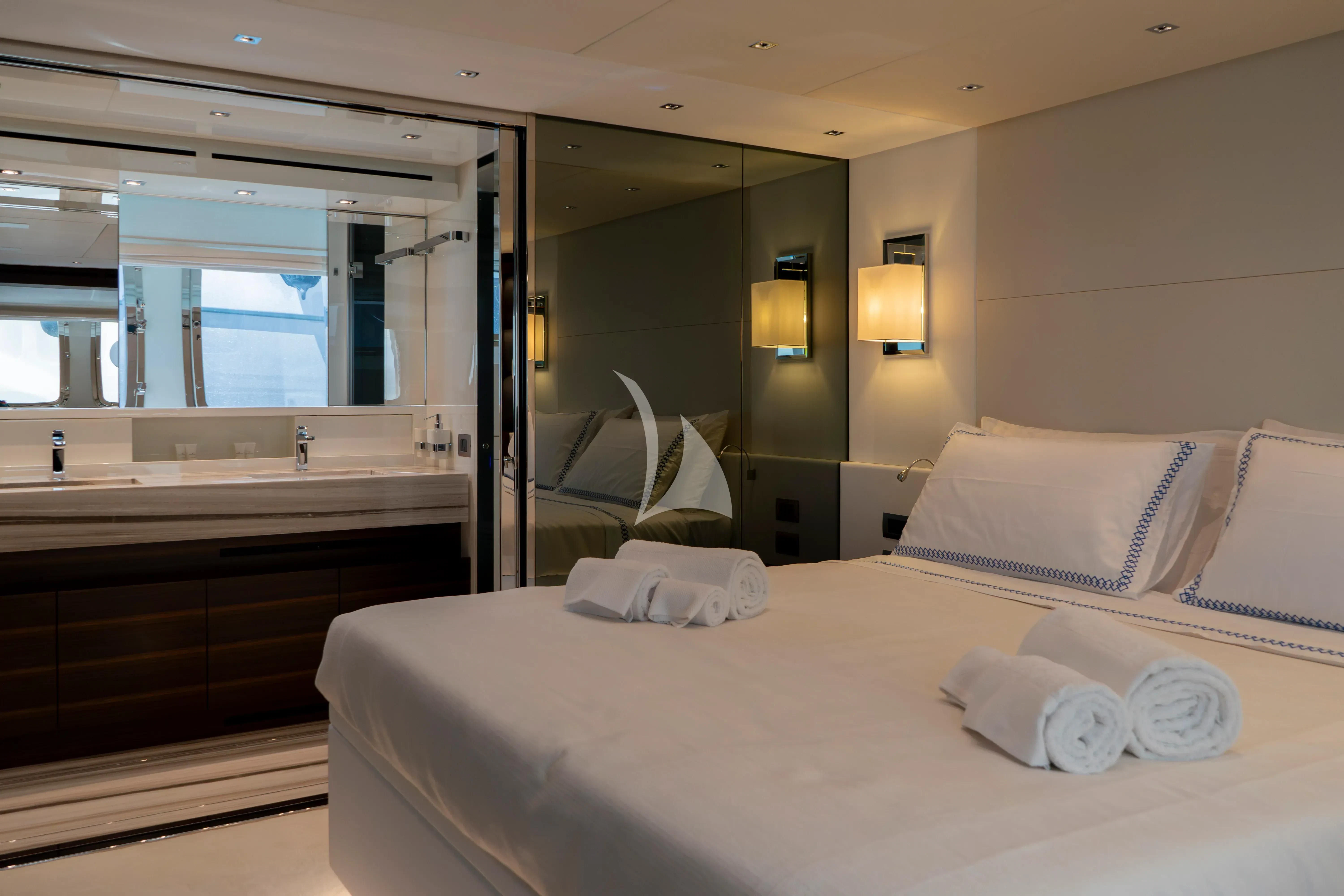a hotel room with a large mirror aboard QUEEN MARTINA Yacht for Sale