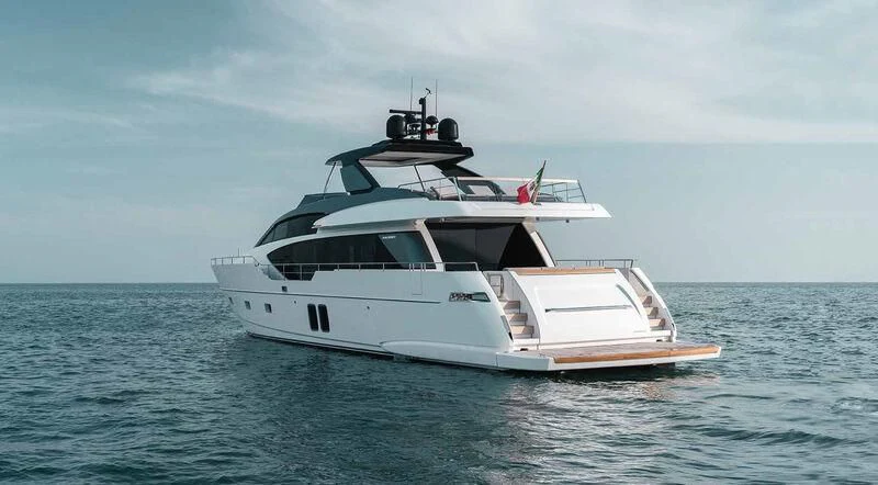 a white yacht in the water aboard QUEEN MARTINA Yacht for Sale