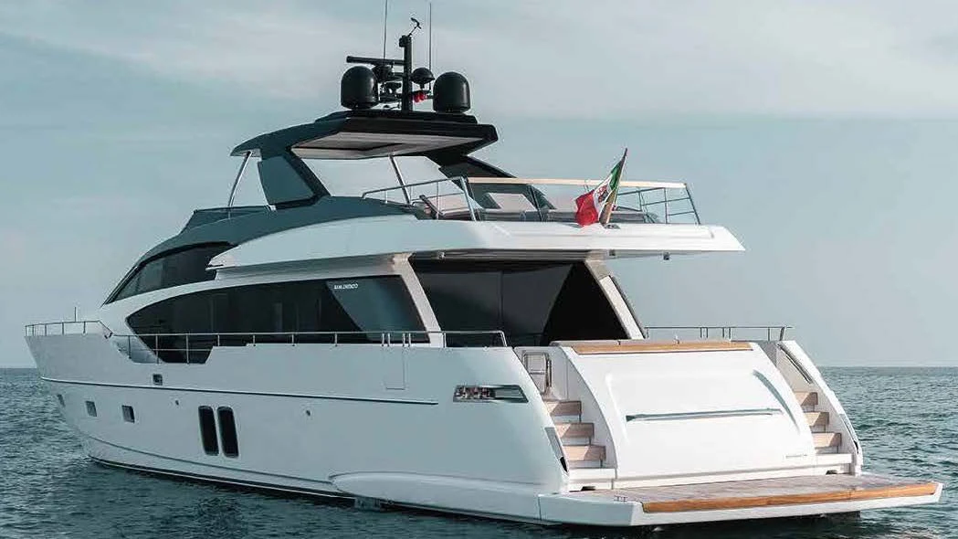 a white yacht in the water aboard QUEEN MARTINA Yacht for Sale