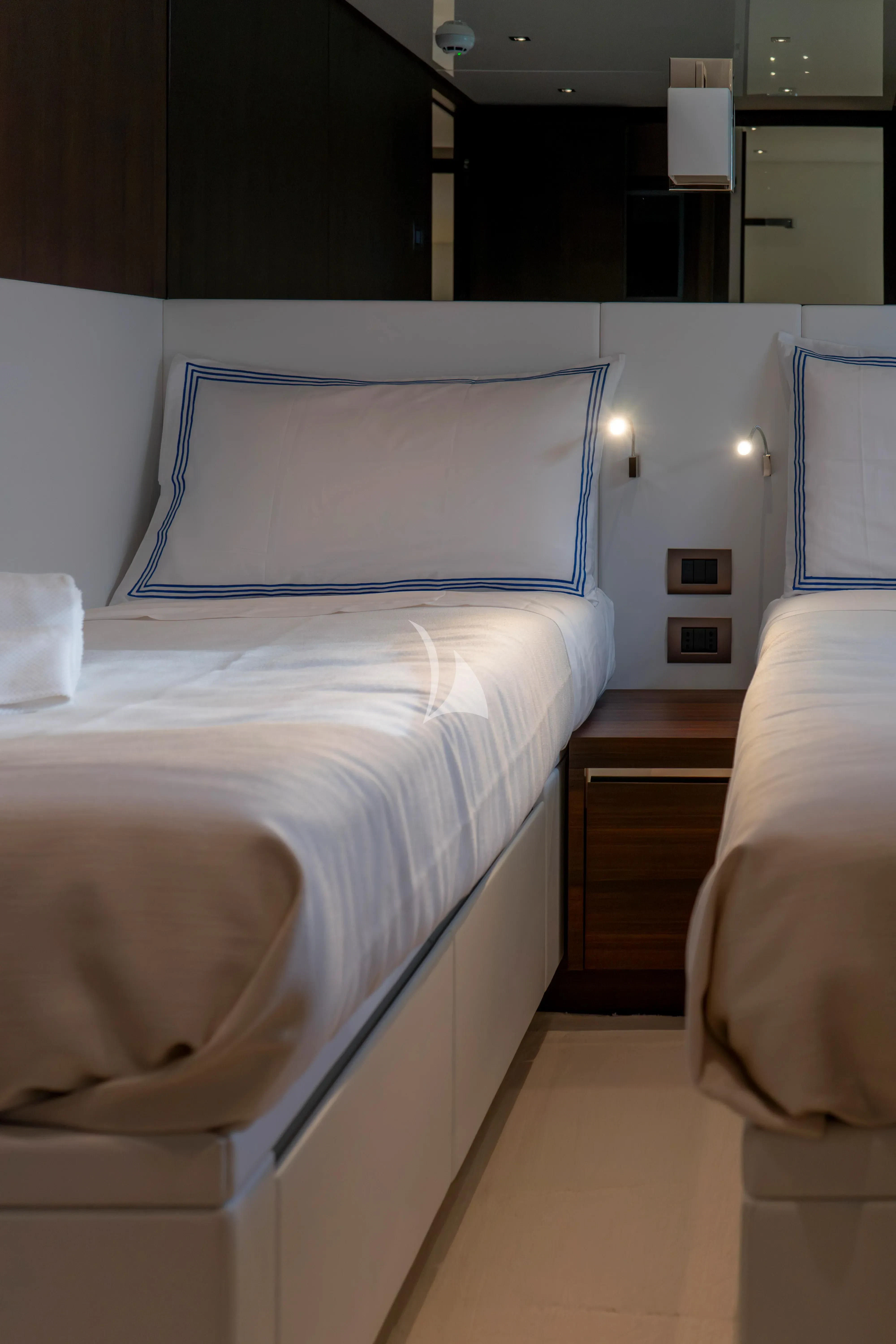 a room with a bed and a mirror aboard QUEEN MARTINA Yacht for Sale