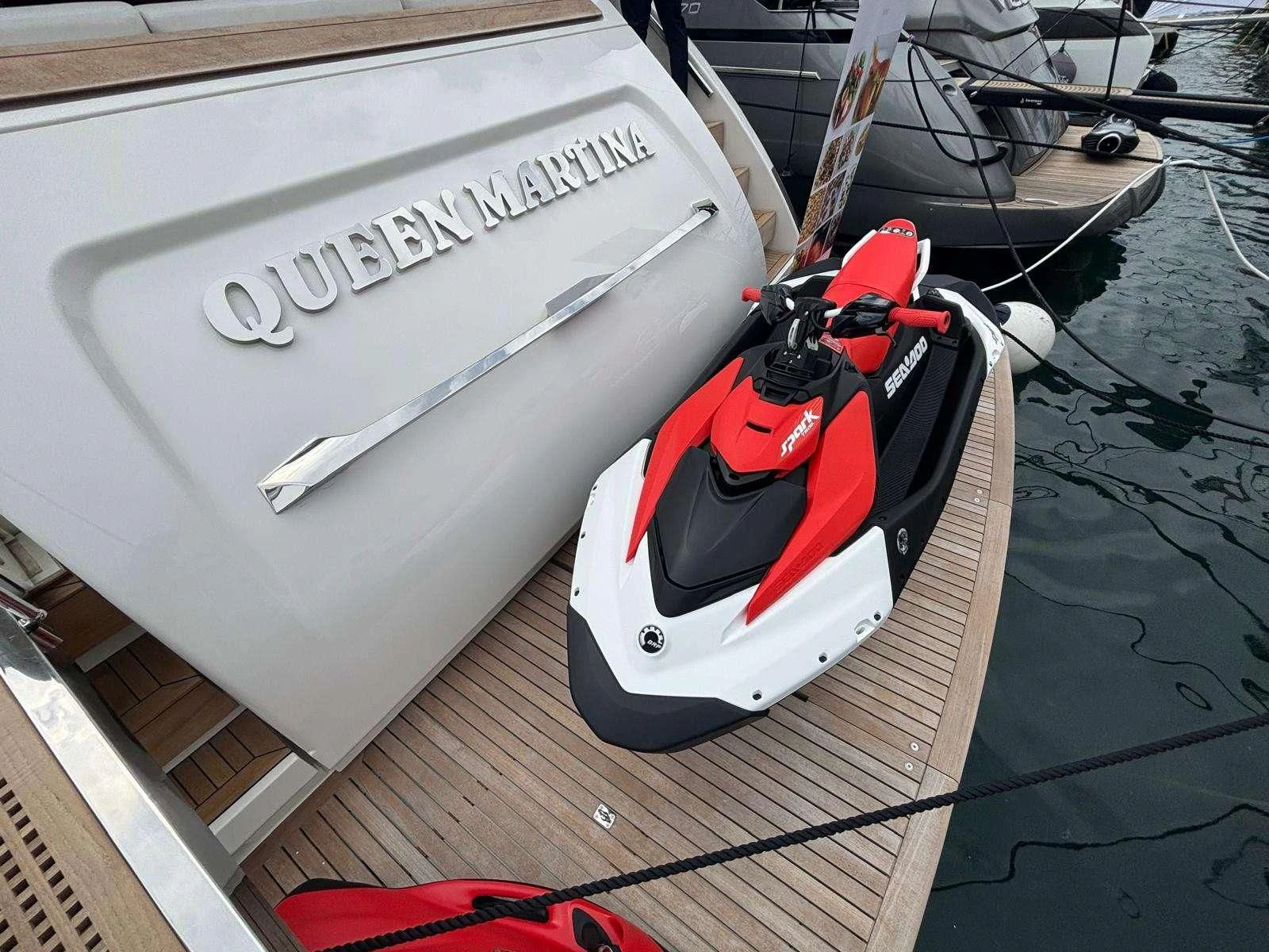 a boat with a red and white sail aboard QUEEN MARTINA Yacht for Sale