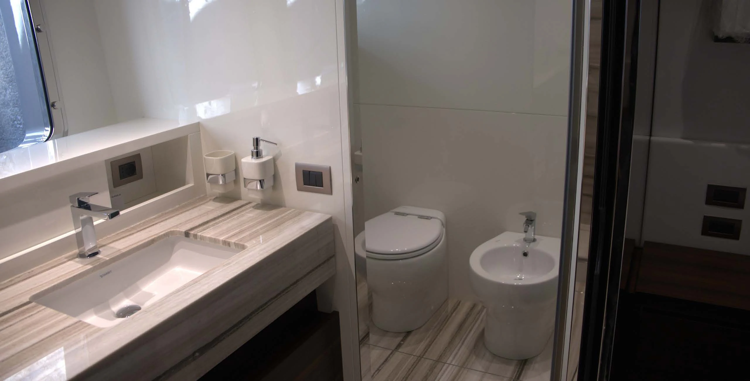 a bathroom with a sink and a toilet aboard QUEEN MARTINA Yacht for Sale