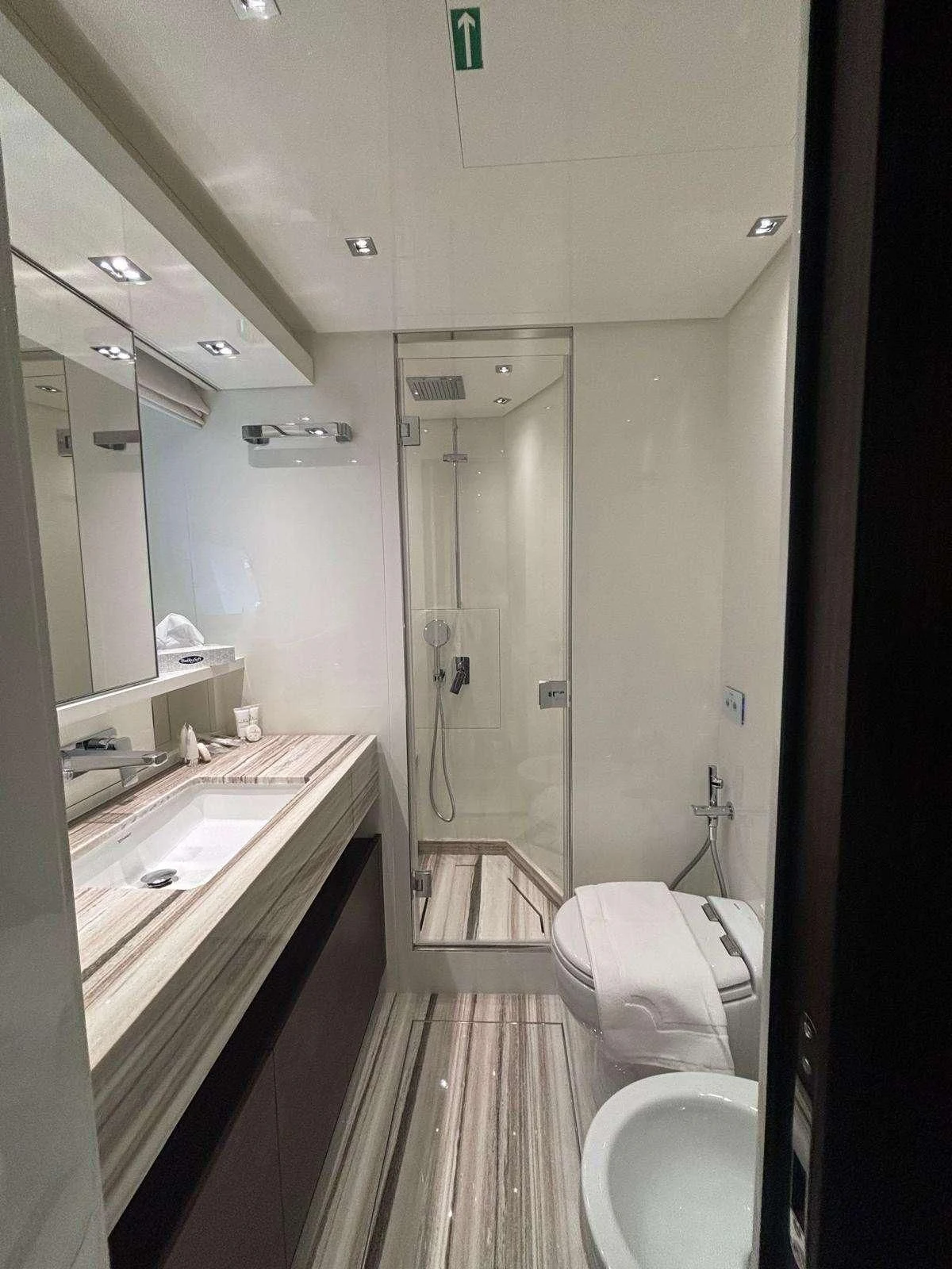 a bathroom with a shower and sink aboard QUEEN MARTINA Yacht for Sale