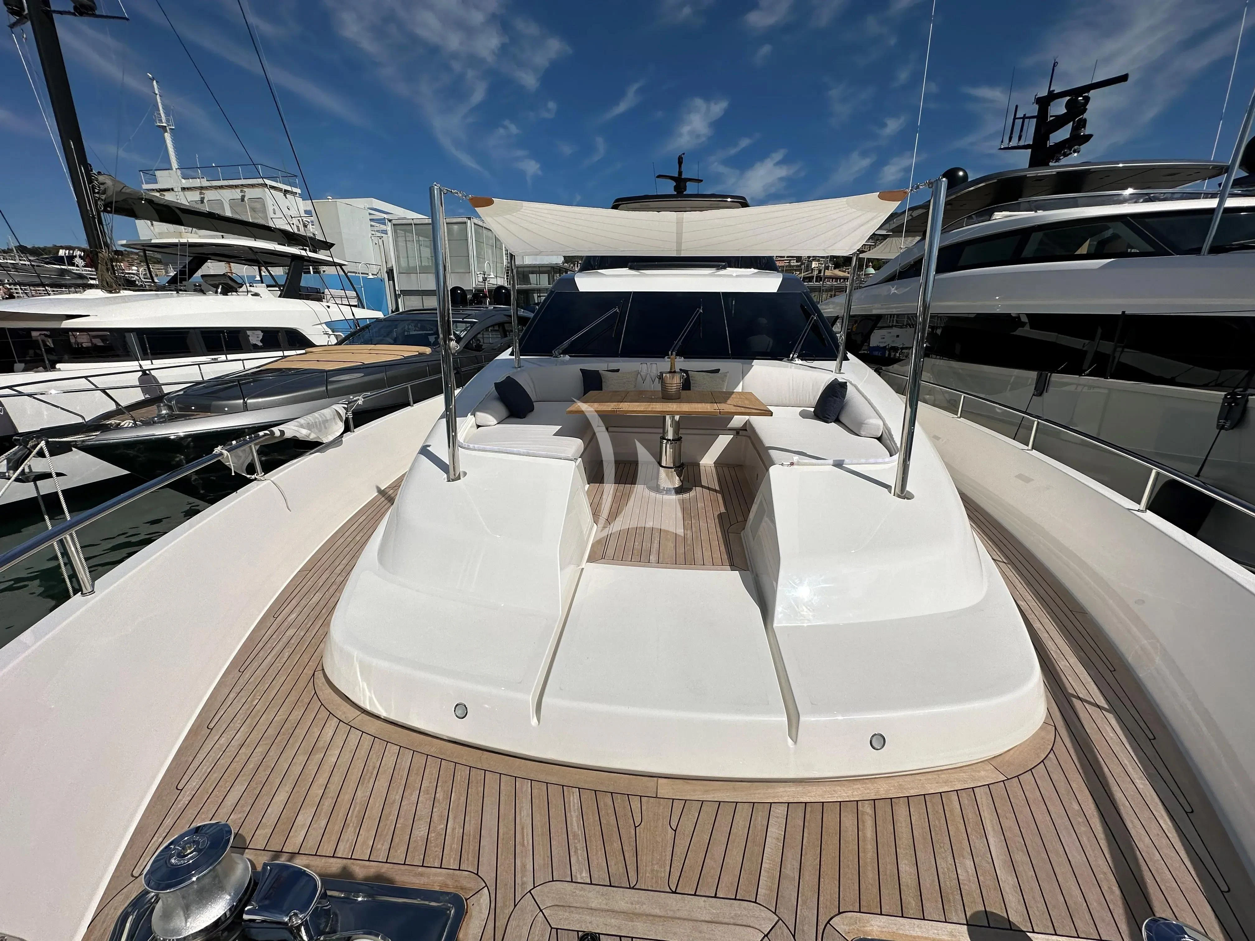a deck with a boat and a dock with many boats aboard QUEEN MARTINA Yacht for Sale
