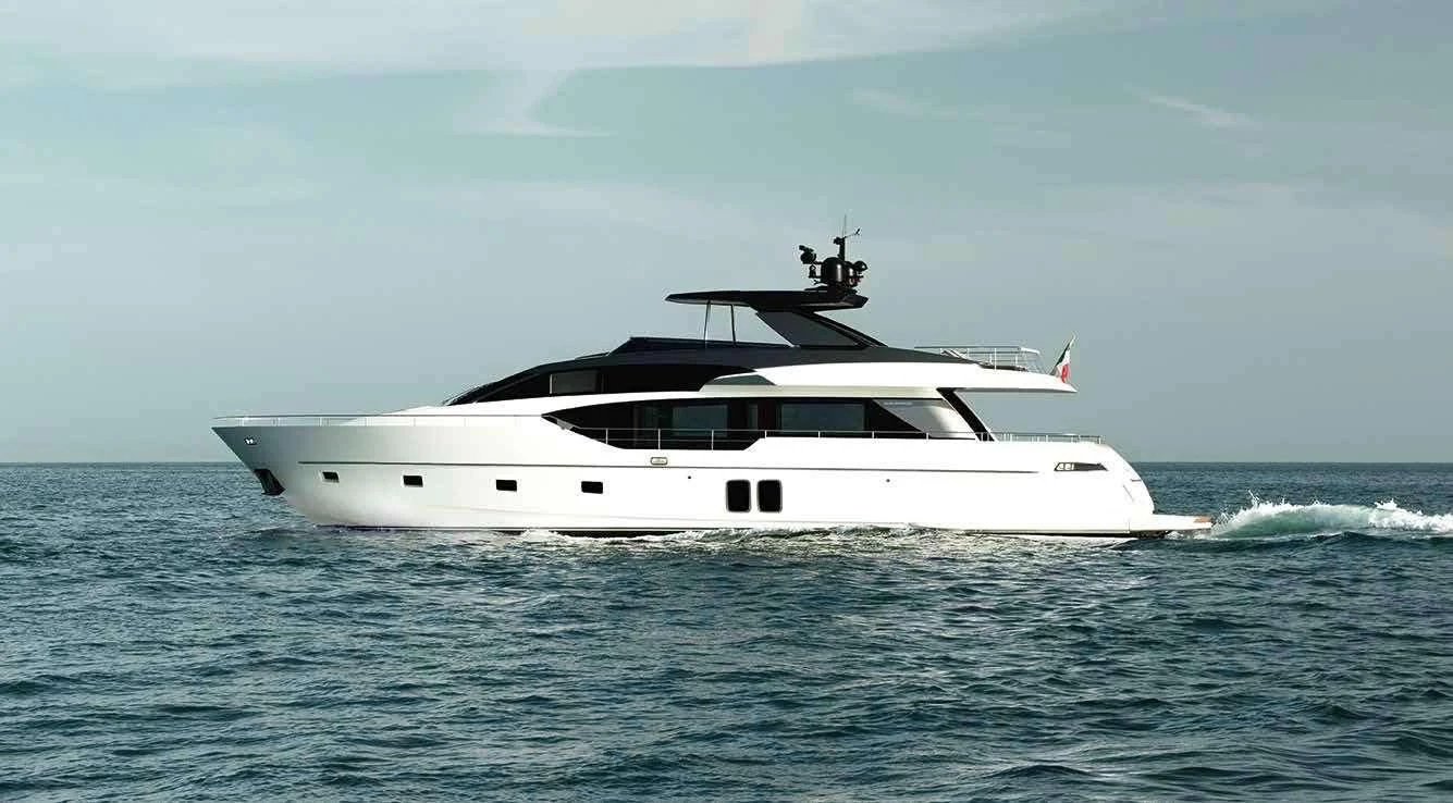 a white yacht in the water aboard QUEEN MARTINA Yacht for Sale