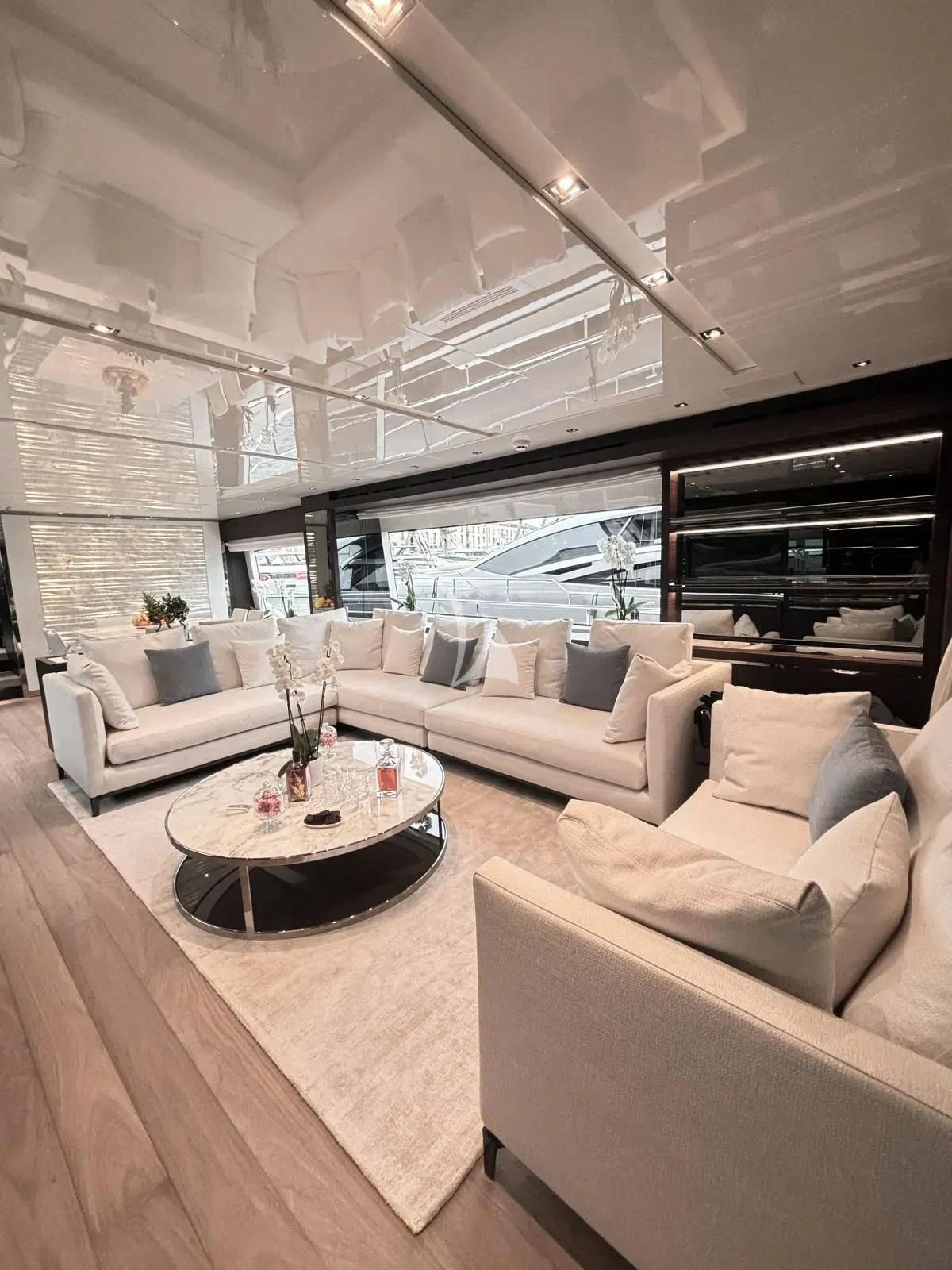 a living room with a large fireplace aboard QUEEN MARTINA Yacht for Sale