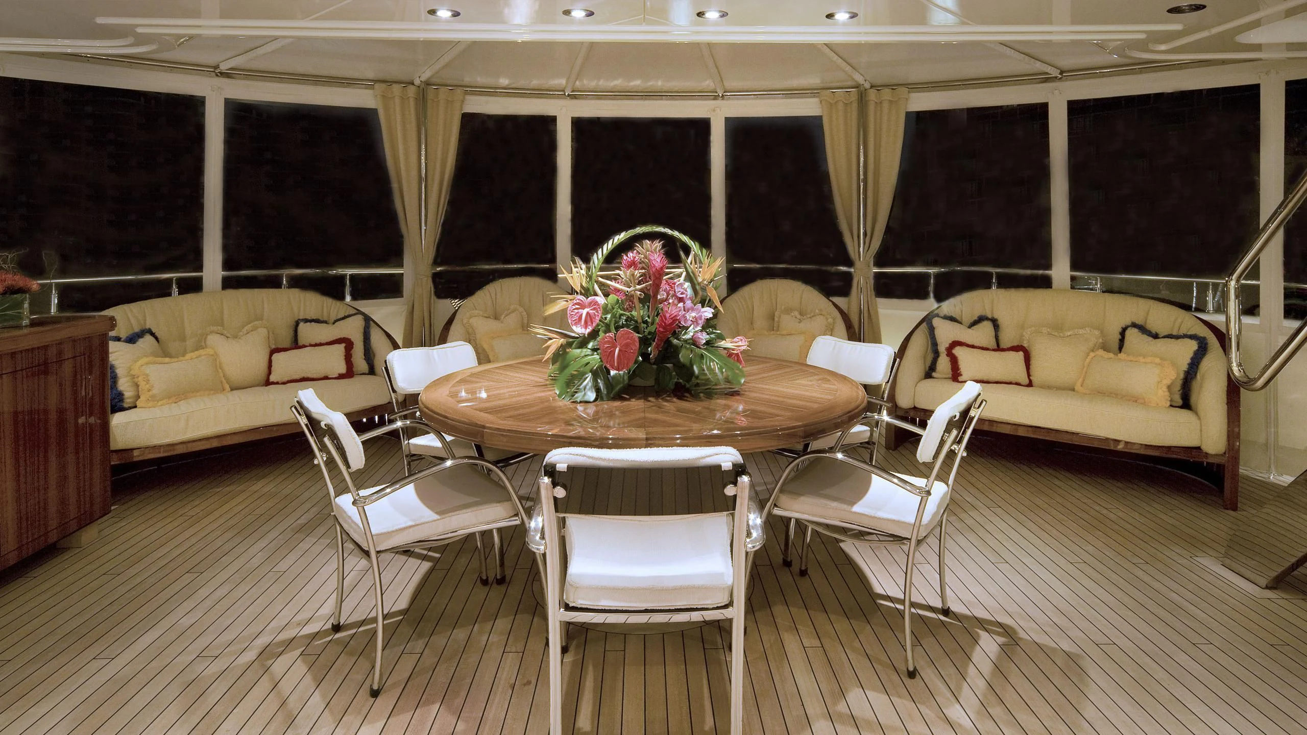 a table and chairs in a room aboard SECOND LOVE Yacht for Charter