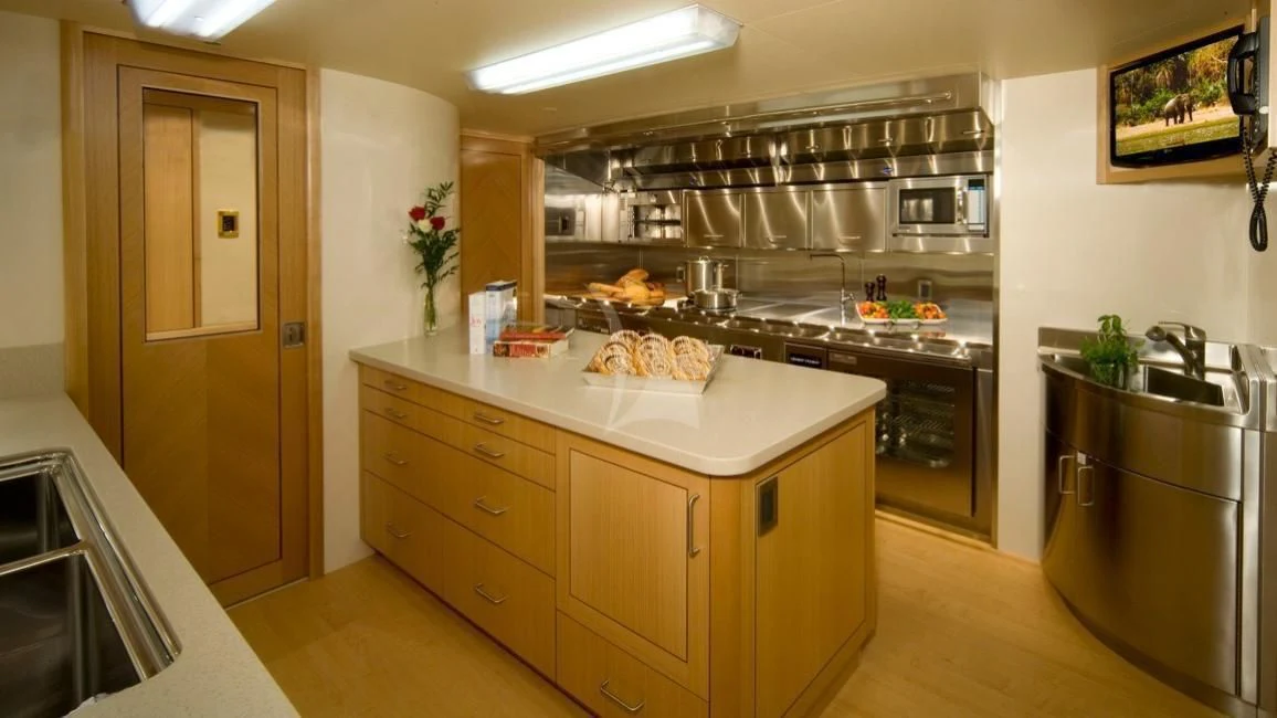 a kitchen with a large island aboard SECOND LOVE Yacht for Charter
