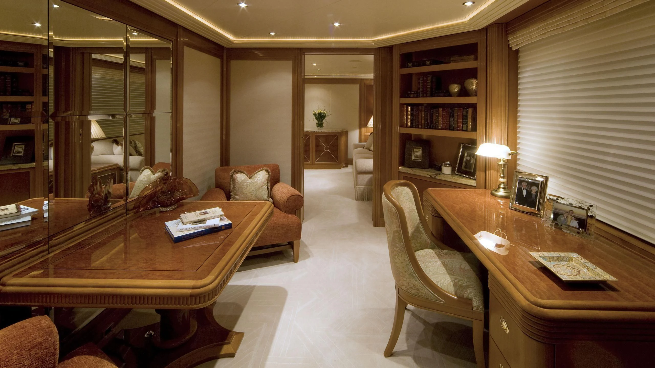 a living room with a table and couches aboard SECOND LOVE Yacht for Charter