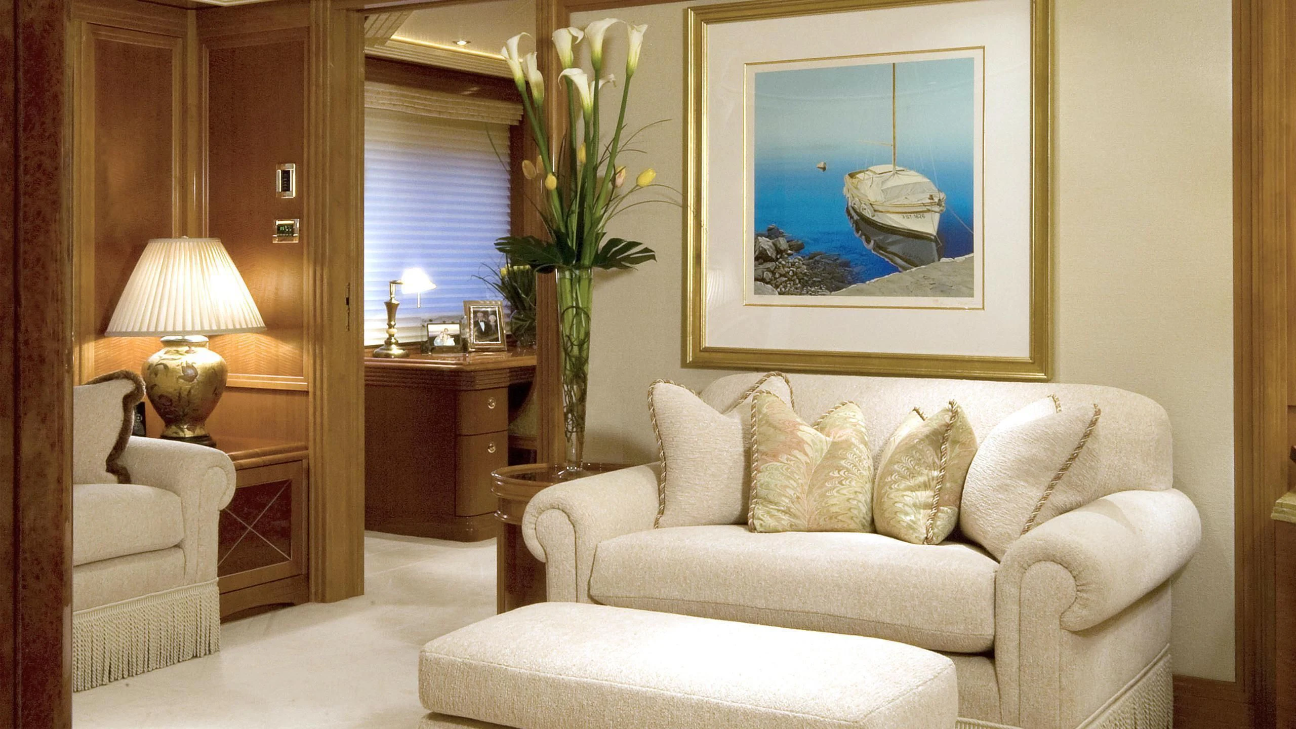 a living room with a white couch aboard SECOND LOVE Yacht for Charter
