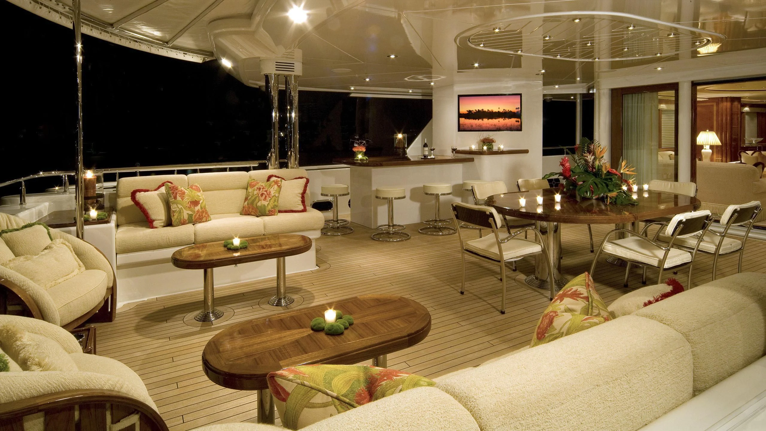 a large living room with a large table and chairs aboard SECOND LOVE Yacht for Charter