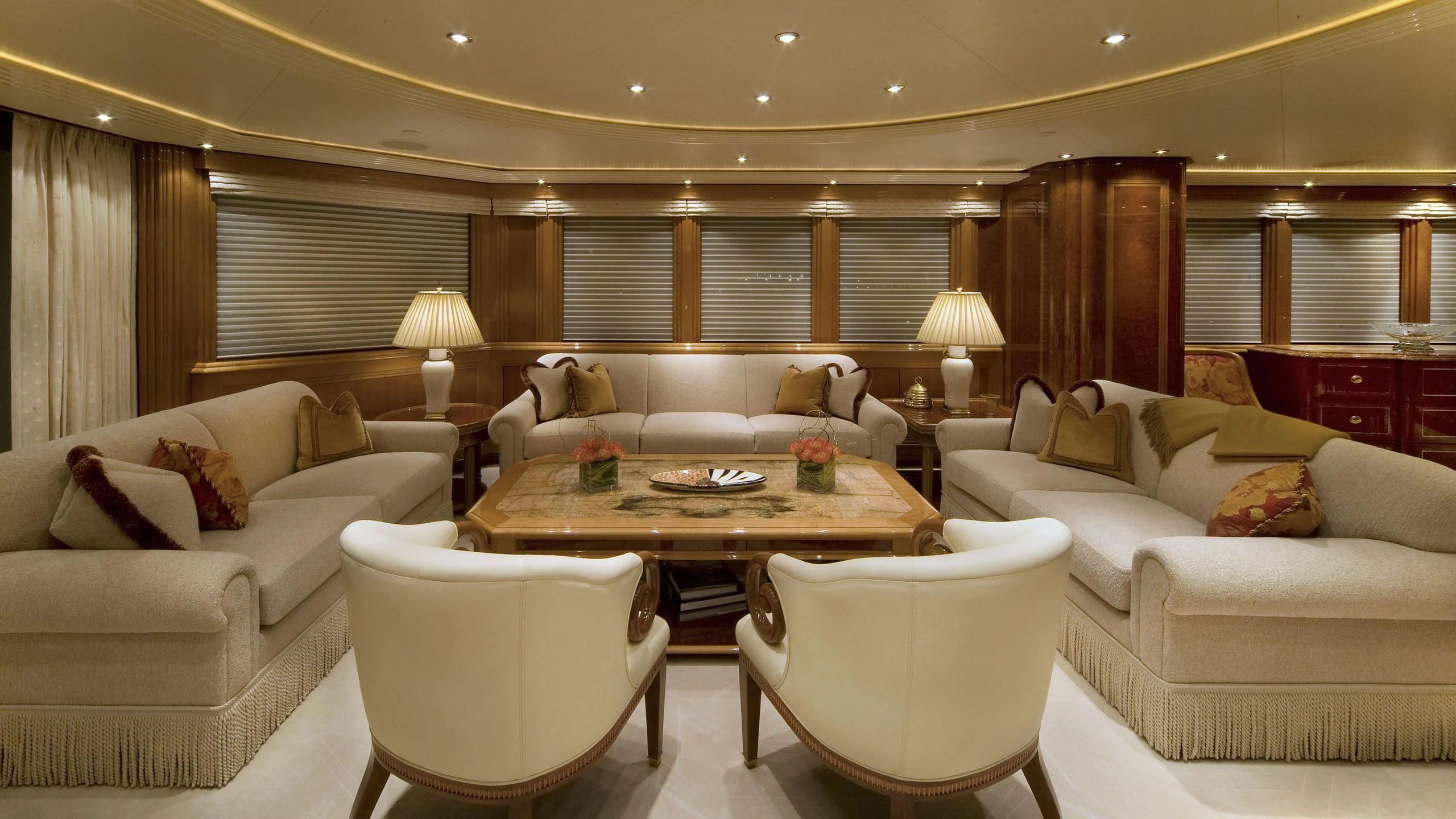 a living room with a couch and a table aboard SECOND LOVE Yacht for Charter