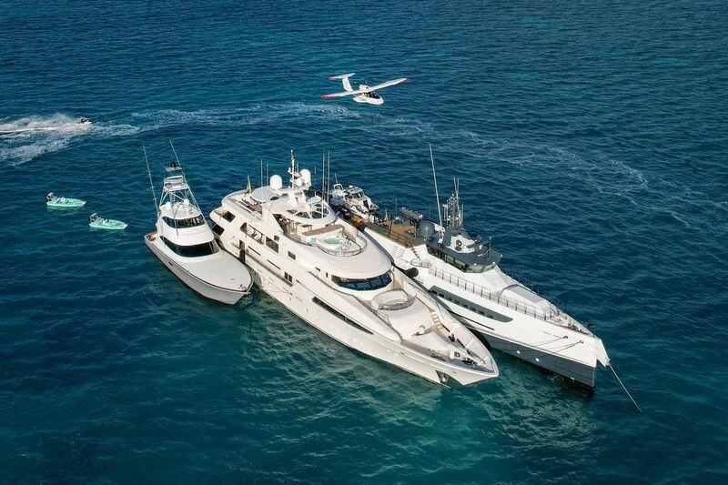 a helicopter flying over a ship aboard SECOND LOVE Yacht for Charter
