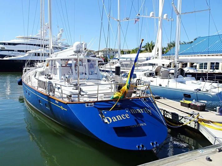 a group of boats are parked in a harbor aboard DANCE SMARTLY Yacht for Sale