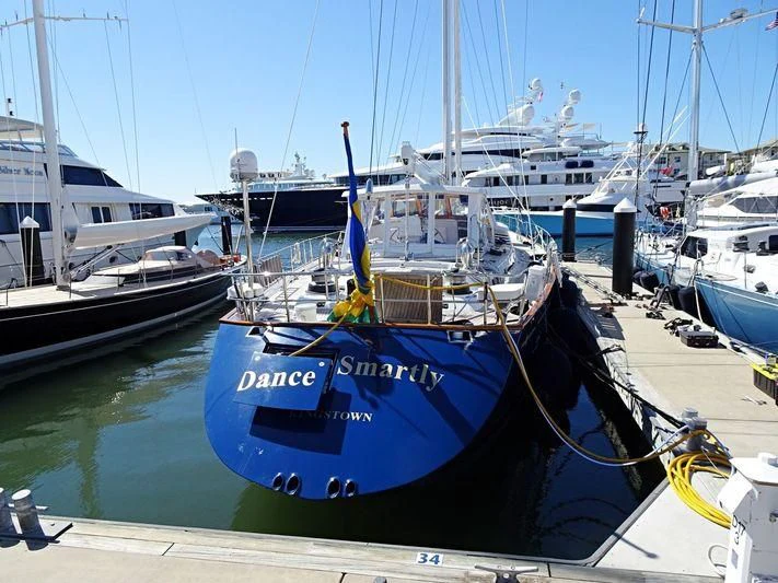 boats docked at a pier aboard DANCE SMARTLY Yacht for Sale