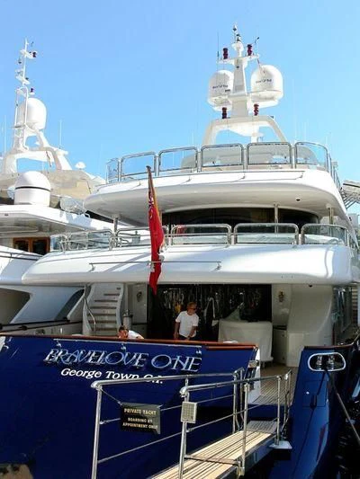 a boat with a sign on the front aboard BRAVELOVE ONE Yacht for Sale