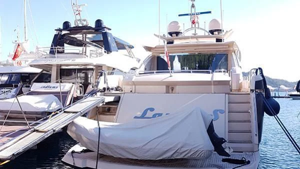 a group of boats are parked aboard LAURA S Yacht for Sale