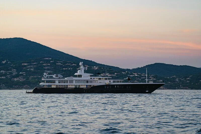 a large ship in the water aboard AIR Yacht for Sale