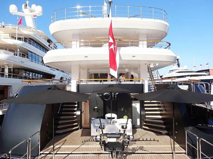 a large cruise ship docked aboard AIR Yacht for Sale