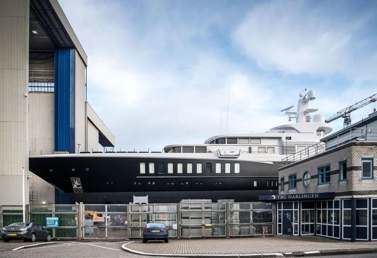 a large ship in a harbor aboard AIR Yacht for Sale
