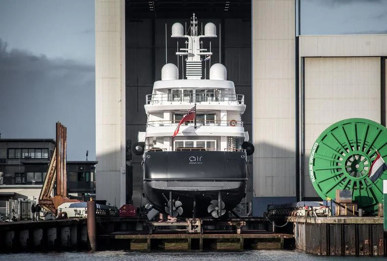 a large ship in a harbor aboard AIR Yacht for Sale
