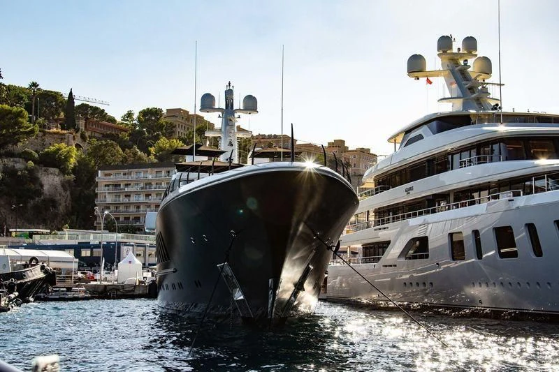 a large ship docked at a port aboard AIR Yacht for Sale