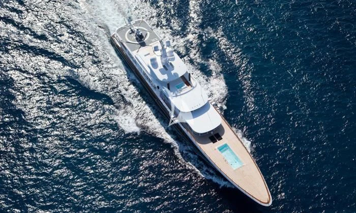 a space shuttle above the earth aboard AIR Yacht for Sale