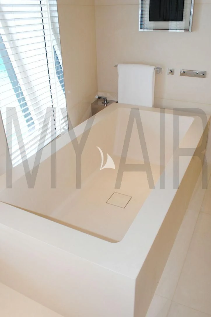 a bathroom with a tile floor aboard AIR Yacht for Sale