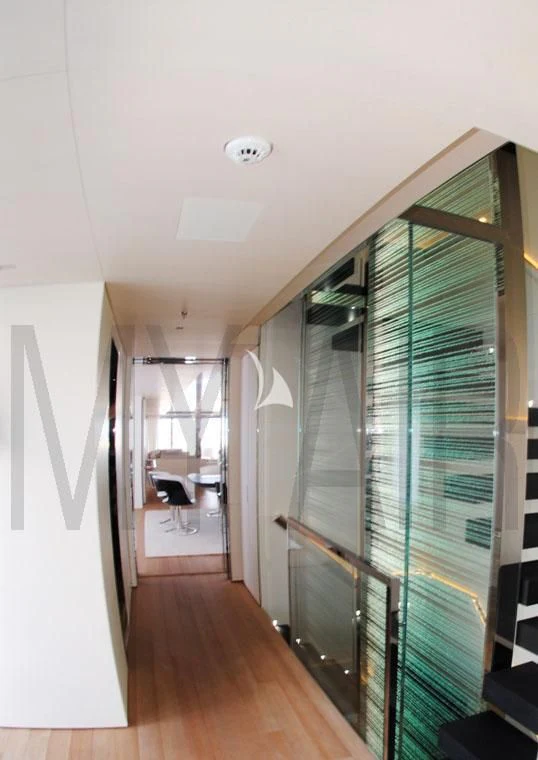 a room with a large glass door aboard AIR Yacht for Sale
