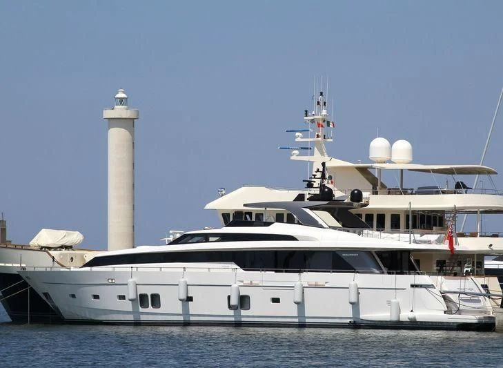 a large white boat in the water aboard GI1 Yacht for Sale