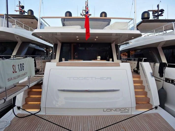 a large white box with a red ribbon on top aboard GI1 Yacht for Sale