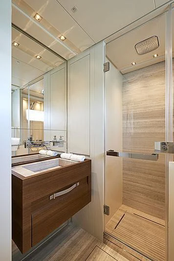a bathroom with a shower unit aboard GI1 Yacht for Sale