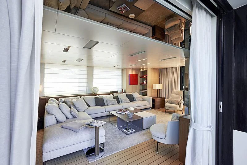 a living room with a large bed aboard GI1 Yacht for Sale