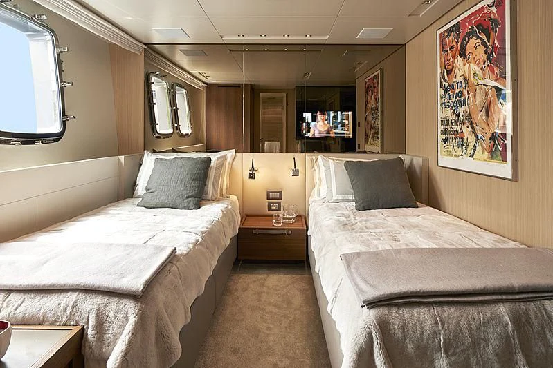 a couple of beds in a hotel room aboard GI1 Yacht for Sale
