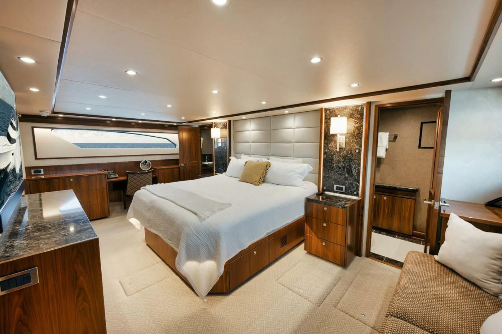 a hotel room with a bed and a desk aboard BELLA DONNA DI Yacht for Sale
