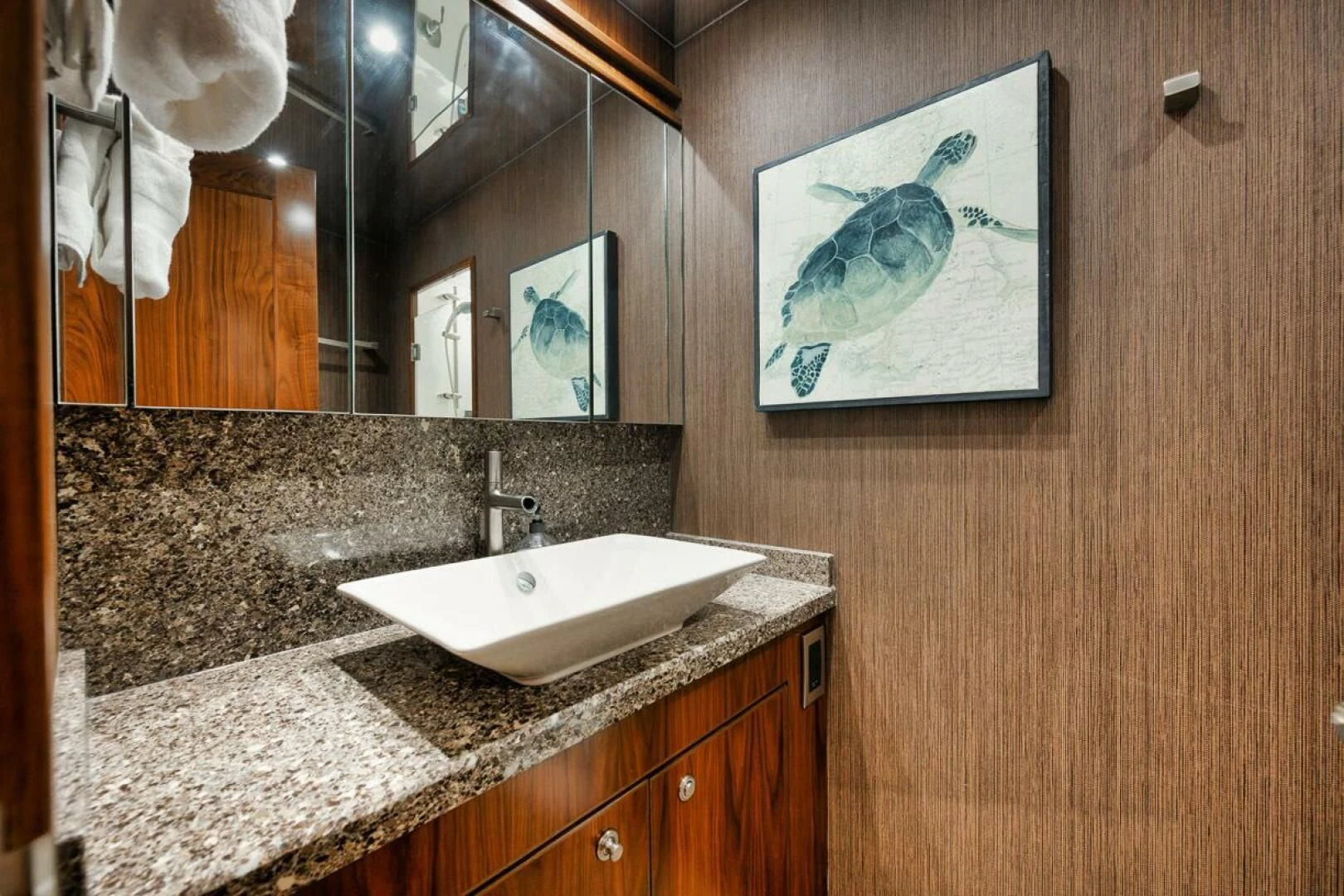 a bathroom with marble counter tops aboard BELLA DONNA DI Yacht for Sale