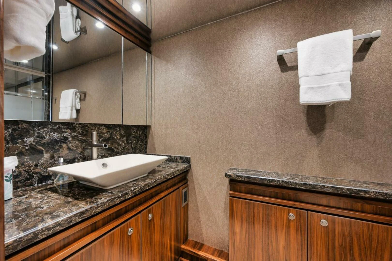 a bathroom with a sink and a mirror aboard BELLA DONNA DI Yacht for Sale