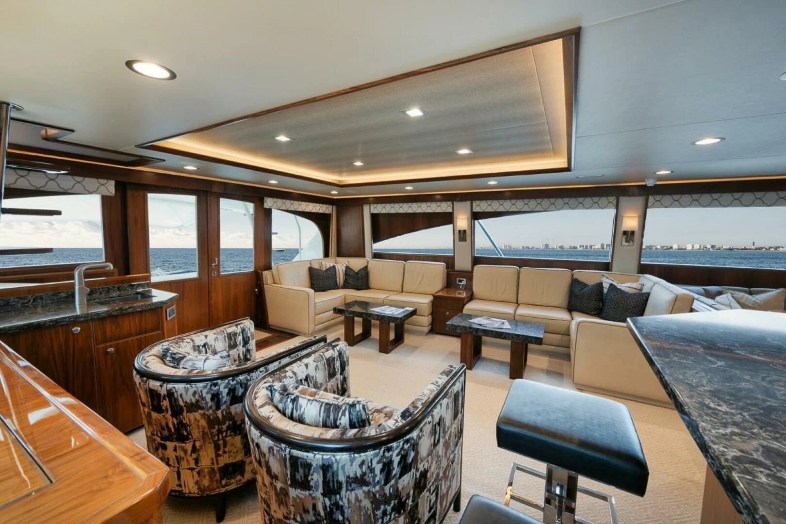 a large living room with a large window aboard BELLA DONNA DI Yacht for Sale