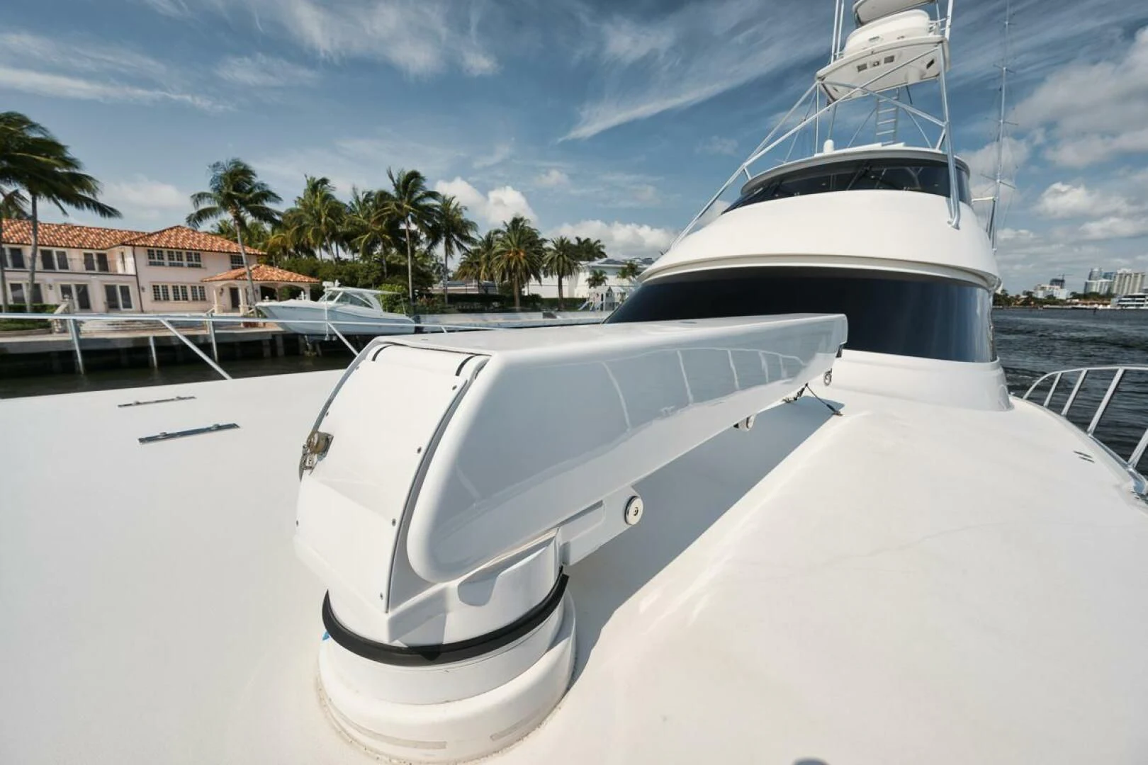 a white boat on a dock aboard BELLA DONNA DI Yacht for Sale