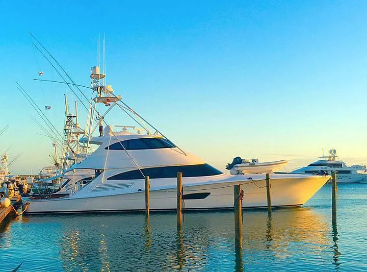 a large white boat in a harbor aboard BELLA DONNA DI Yacht for Sale