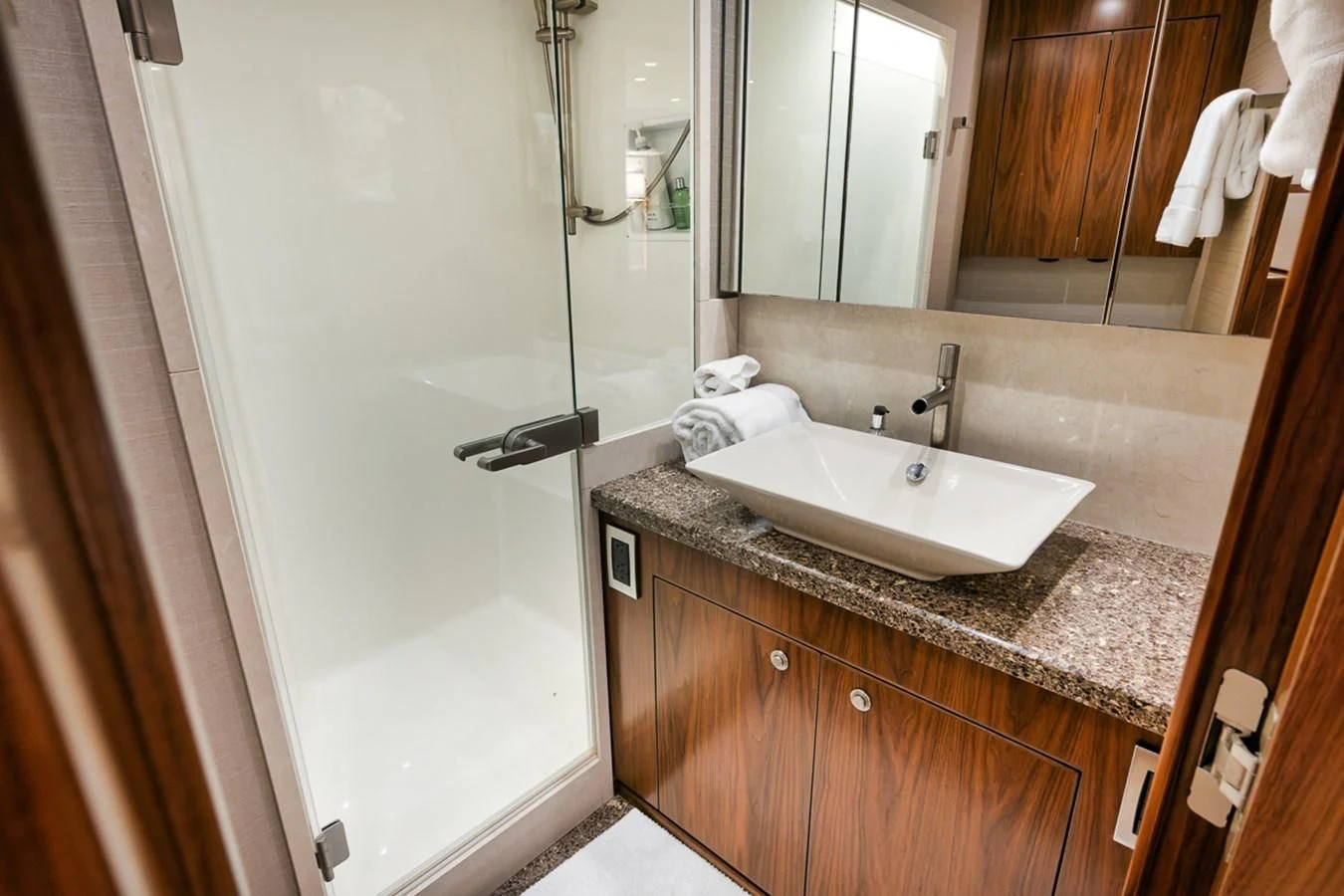 a bathroom with a sink and a mirror aboard BELLA DONNA DI Yacht for Sale