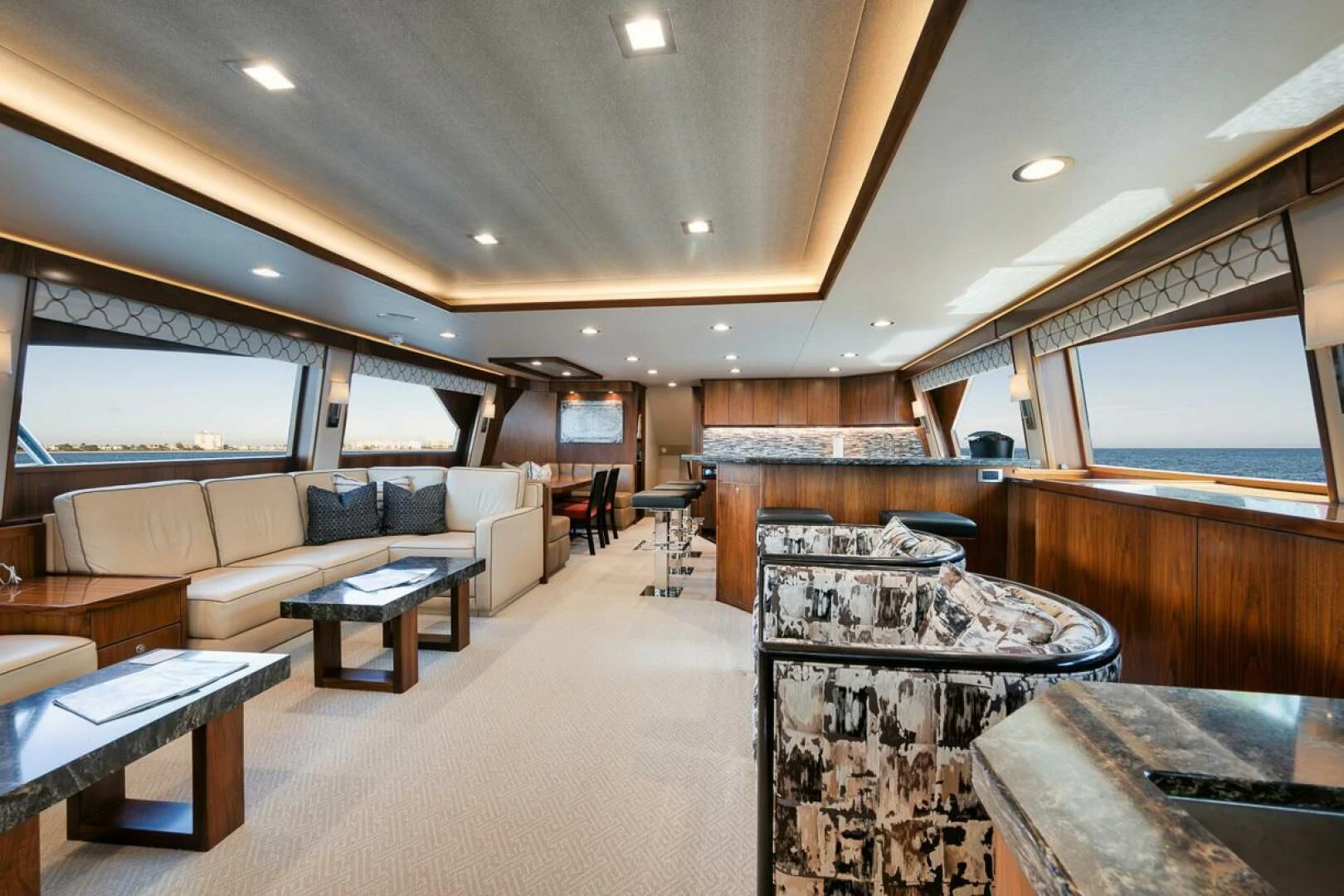 a large living room with a large window aboard BELLA DONNA DI Yacht for Sale