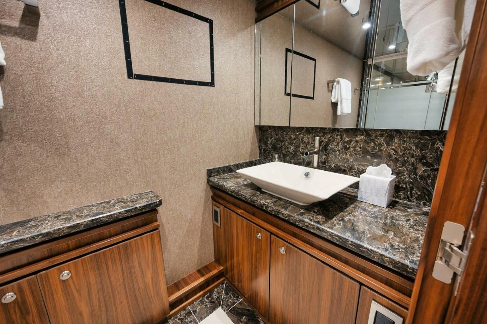 a bathroom with a marble counter top aboard BELLA DONNA DI Yacht for Sale