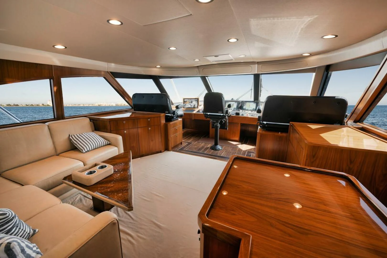 a room with a couch and a table and a television aboard BELLA DONNA DI Yacht for Sale
