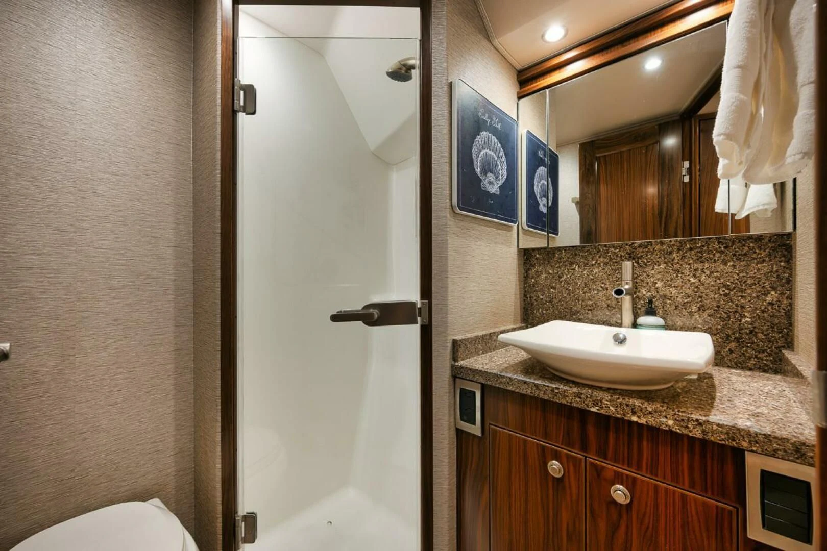 a bathroom with a sink and a mirror aboard BELLA DONNA DI Yacht for Sale