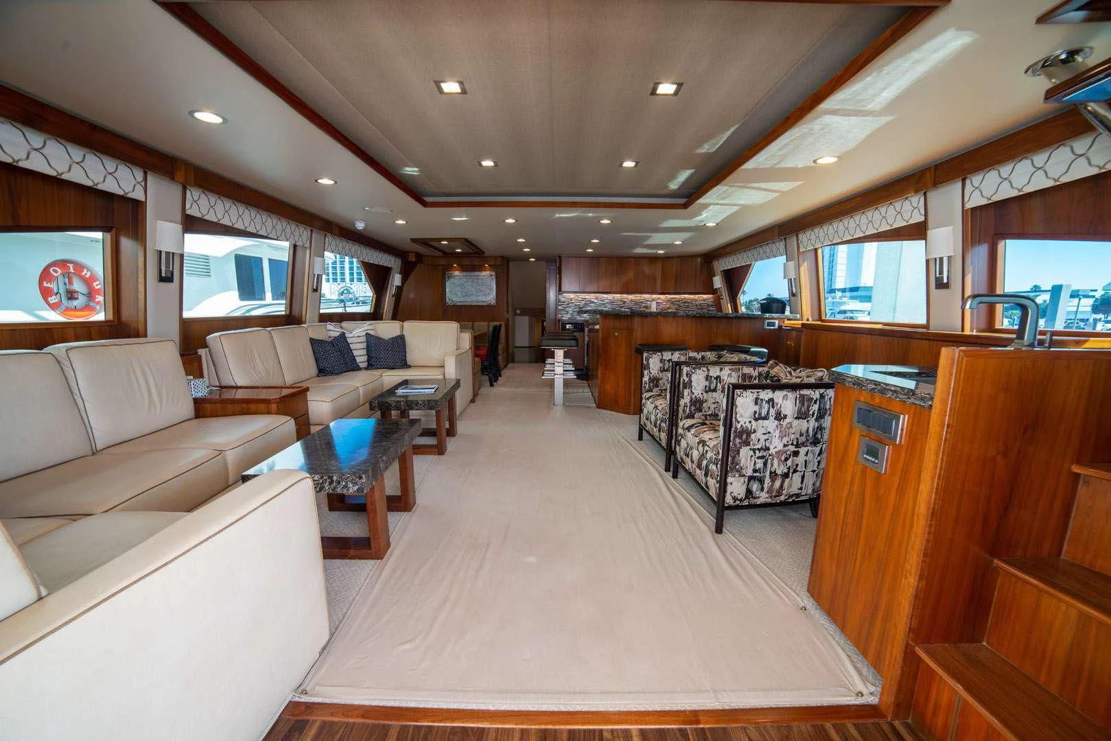 a large room with a couch and a table aboard BELLA DONNA DI Yacht for Sale