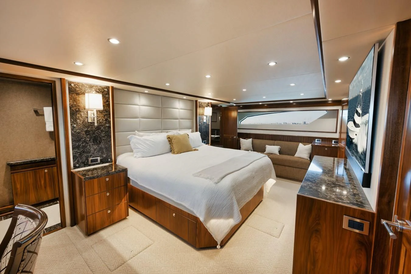 a hotel room with a bed and a desk aboard BELLA DONNA DI Yacht for Sale