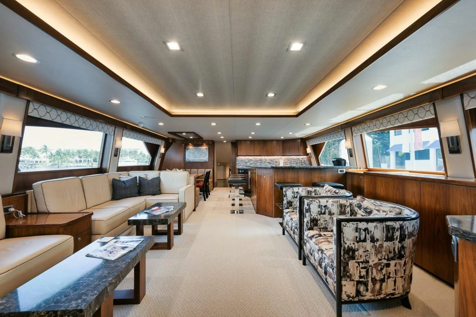 a large living room with a large window aboard BELLA DONNA DI Yacht for Sale