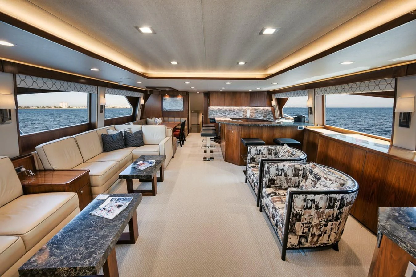 a large living room with a large window aboard BELLA DONNA DI Yacht for Sale