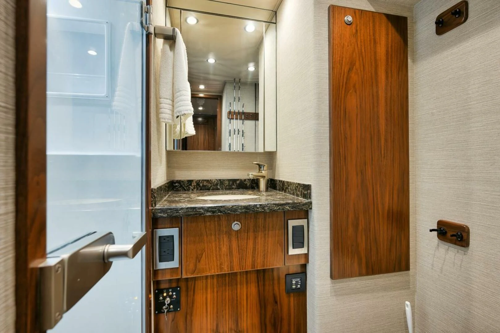 a bathroom with a sink and a mirror aboard BELLA DONNA DI Yacht for Sale